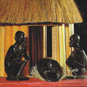 Kerststal van bamboe en ebbenhout